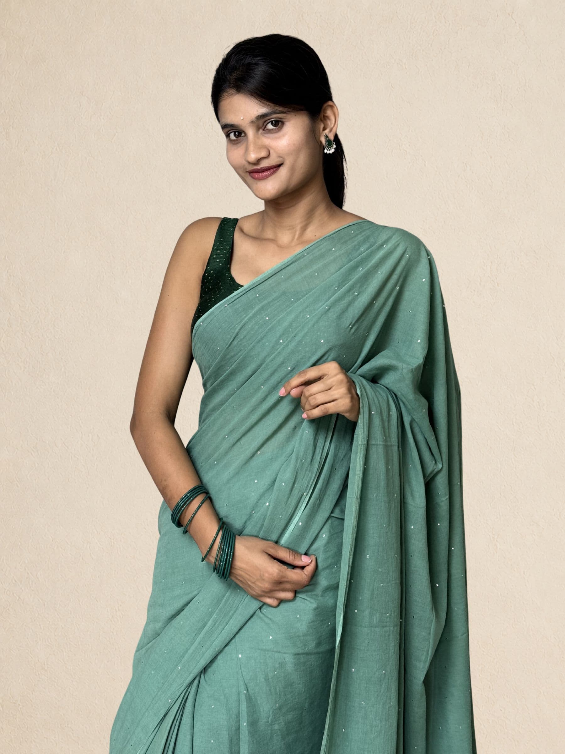 Mukaish Mul Cotton Saree with Crochet Work in Teal Green