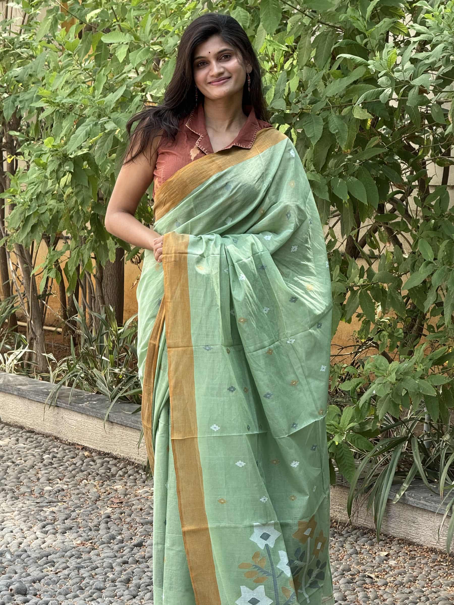 Pastel green needle Jamdani cotton saree with buta motifs