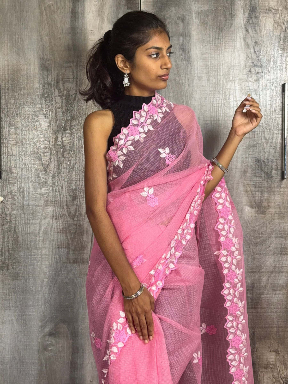 Soft pink embroidered Kota Doria saree with floral border