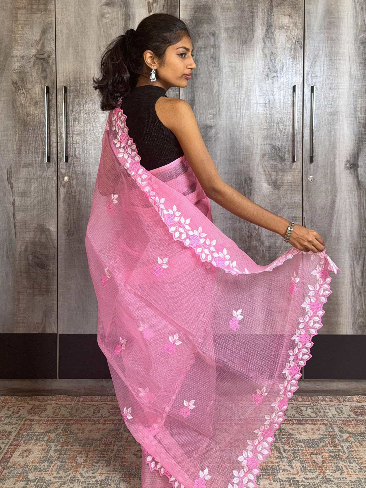 Pink Kota Doria saree with white floral hand embroidery