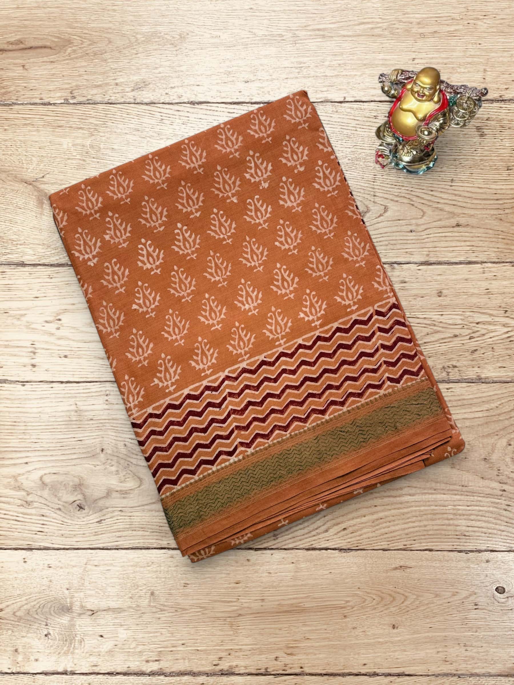 Rust Brown Banana Silk Saree with Dabu hand block print and zari border
